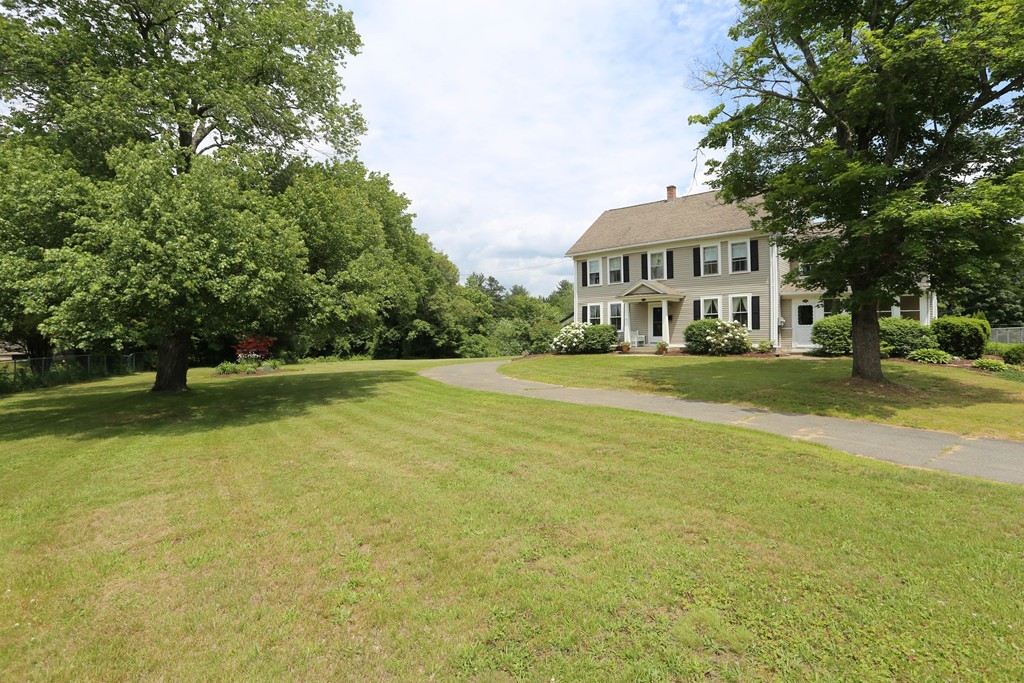118 Bourne Street Three Rivers, MA 01080 - Photo 1 of 30 a front view of a house with a yard