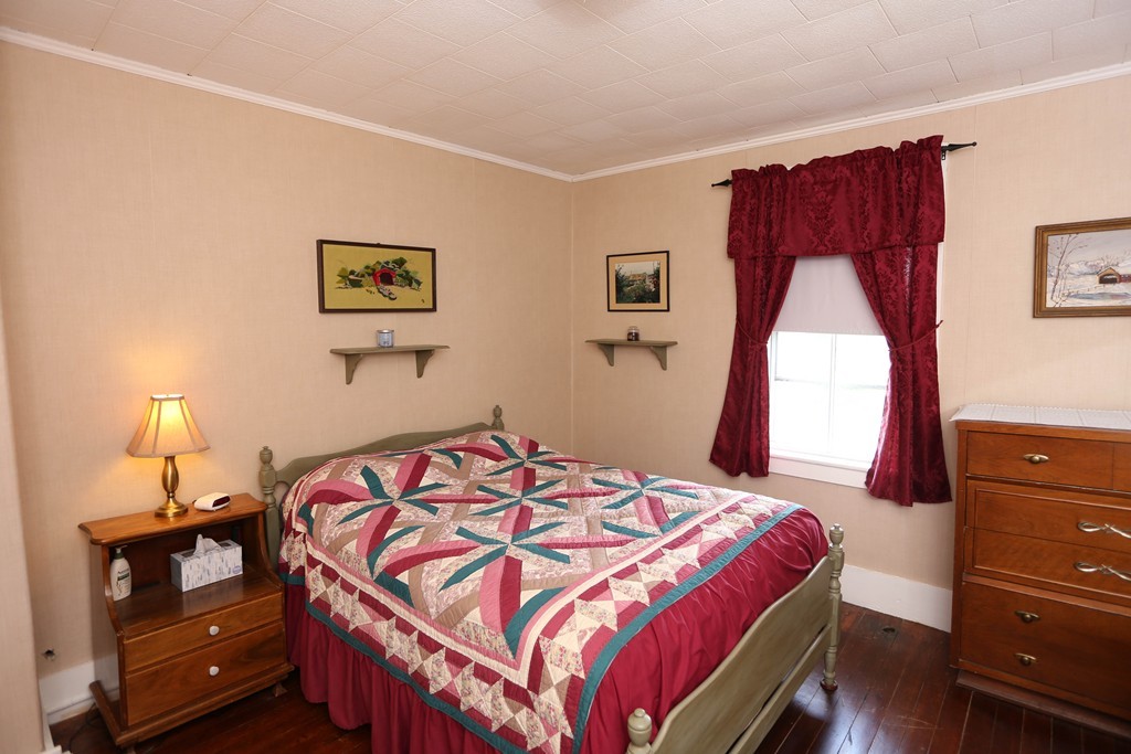 118 Bourne Street Three Rivers, MA 01080 - Photo 16 of 30 a bedroom with a bed and a dresser
