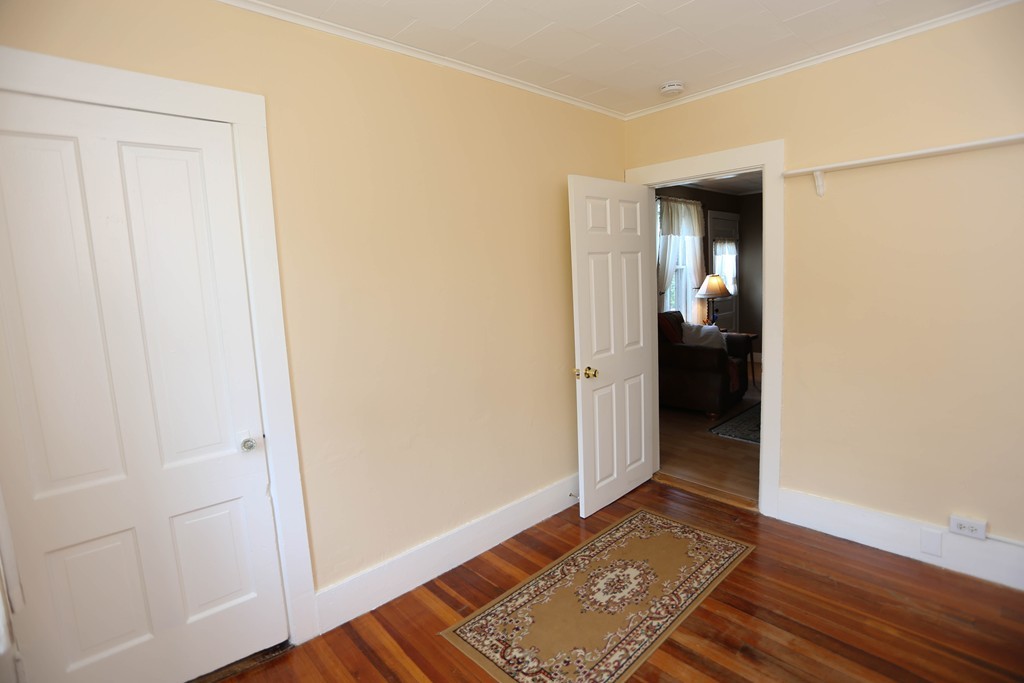 118 Bourne Street Three Rivers, MA 01080 - Photo 19 of 30 a view of a hallway with wooden floor and closet