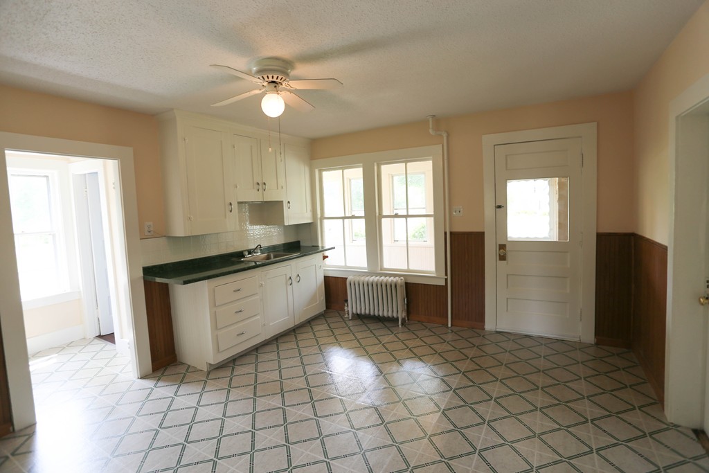 118 Bourne Street Three Rivers, MA 01080 - Photo 23 of 30 a kitchen with a cabinets and window
