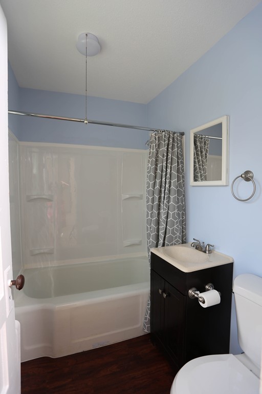 118 Bourne Street Three Rivers, MA 01080 - Photo 29 of 30 a bathroom with a sink a toilet and shower