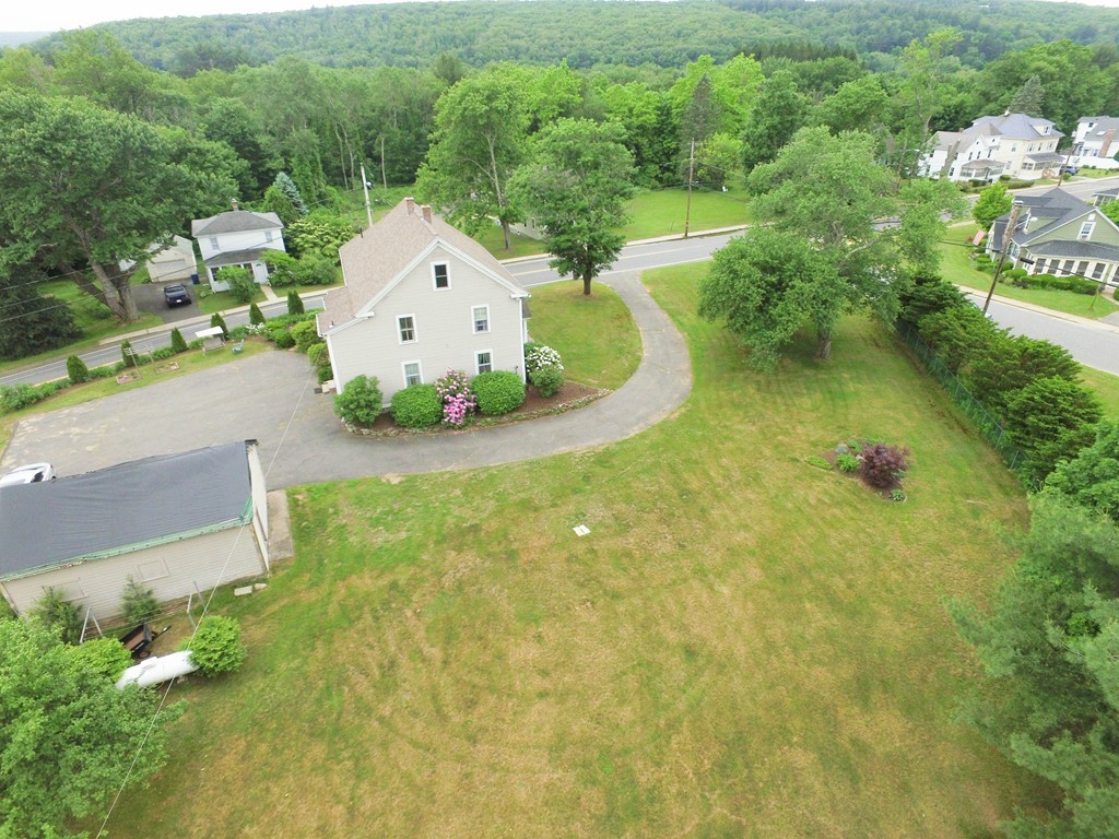 118 Bourne Street Three Rivers, MA 01080 - Photo 30 of 30 an aerial view of a house with a yard and lake view