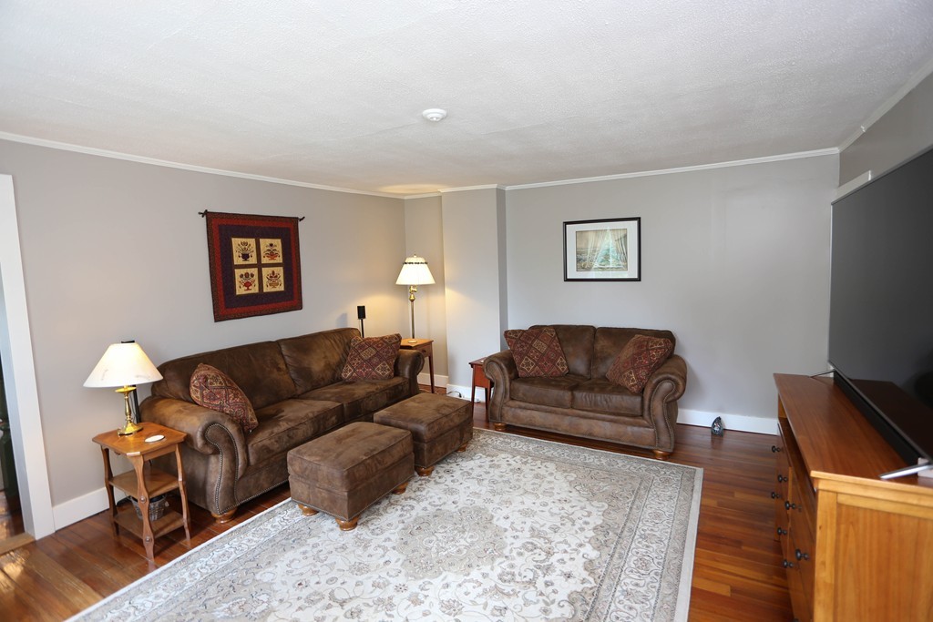 118 Bourne Street Three Rivers, MA 01080 - Photo 8 of 30 a living room with furniture and a flat screen tv