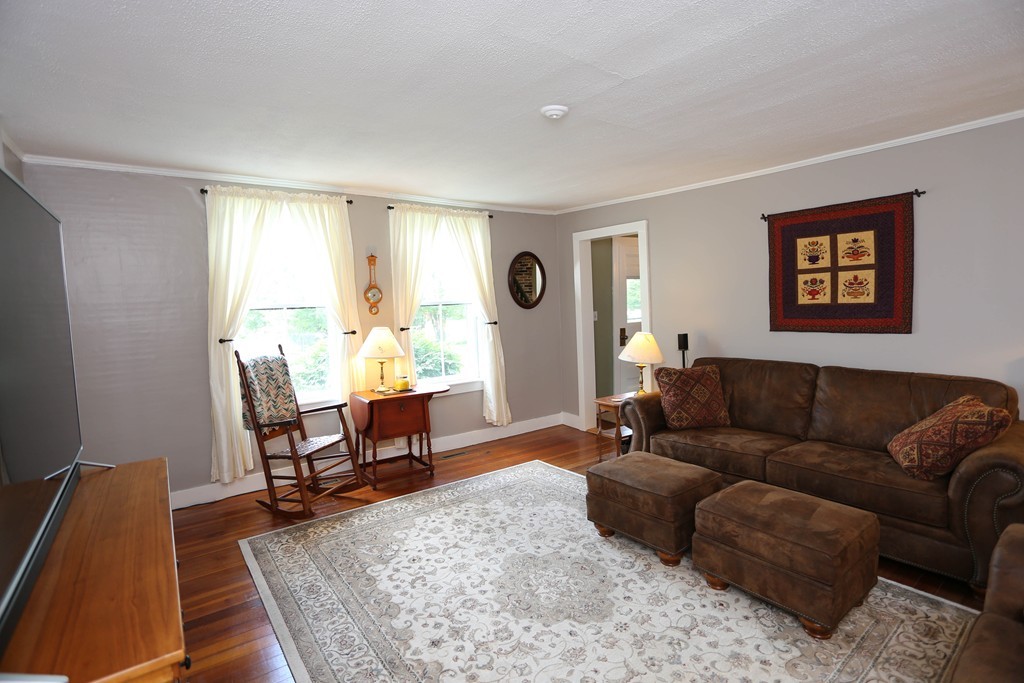 118 Bourne Street Three Rivers, MA 01080 - Photo 9 of 30 a living room with furniture and a wooden floor