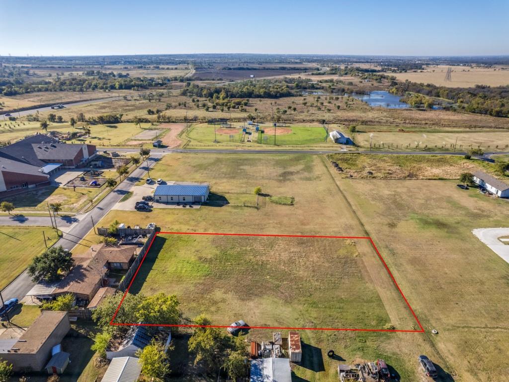Tbd Walnut Gunter, TX 75058 - Photo 4 of 6 an aerial view of residential houses with outdoor space