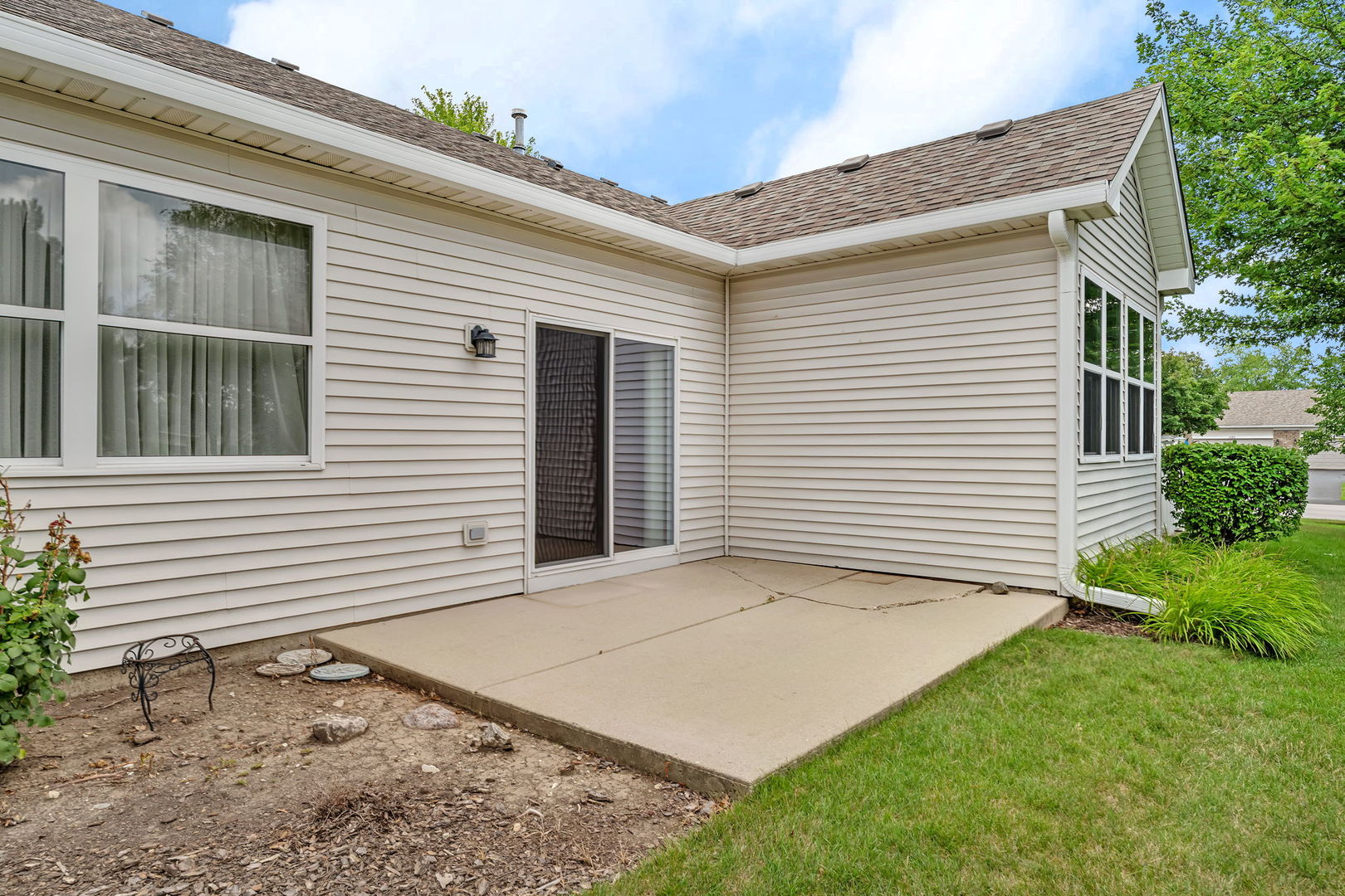 1592 Cadillac Circle Romeoville, IL 60446 - Photo 22 of 25 a front view of a house with a yard