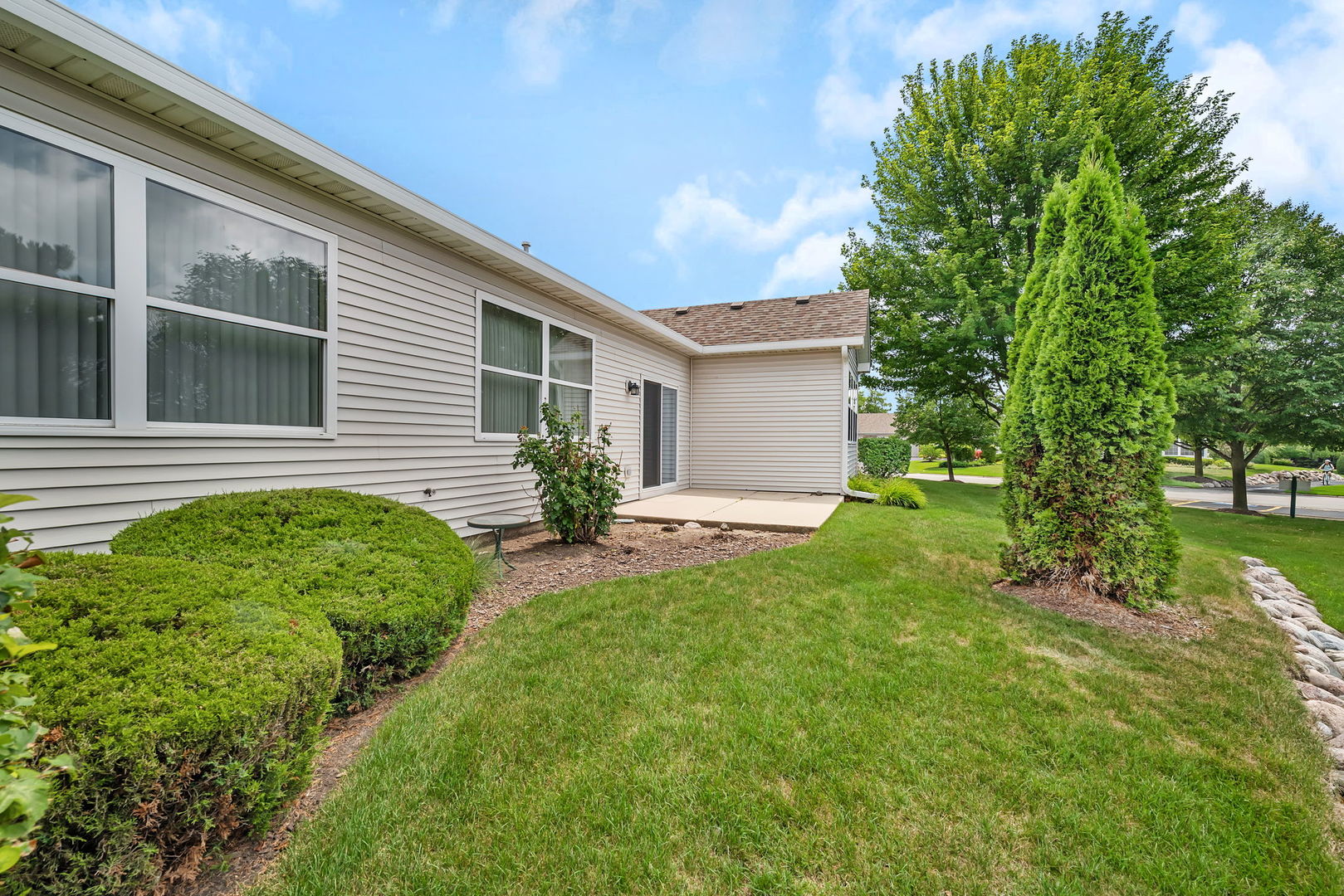 1592 Cadillac Circle Romeoville, IL 60446 - Photo 23 of 25 a front view of a house with garden