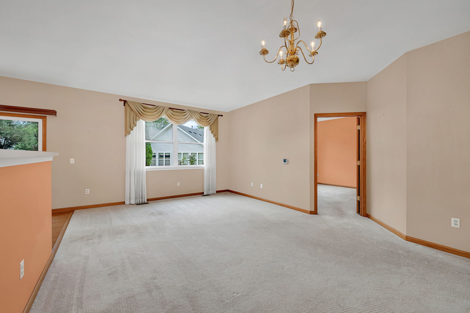 1592 Cadillac Circle Romeoville, IL 60446 - Photo 8 of 25 a view of an empty room with a window