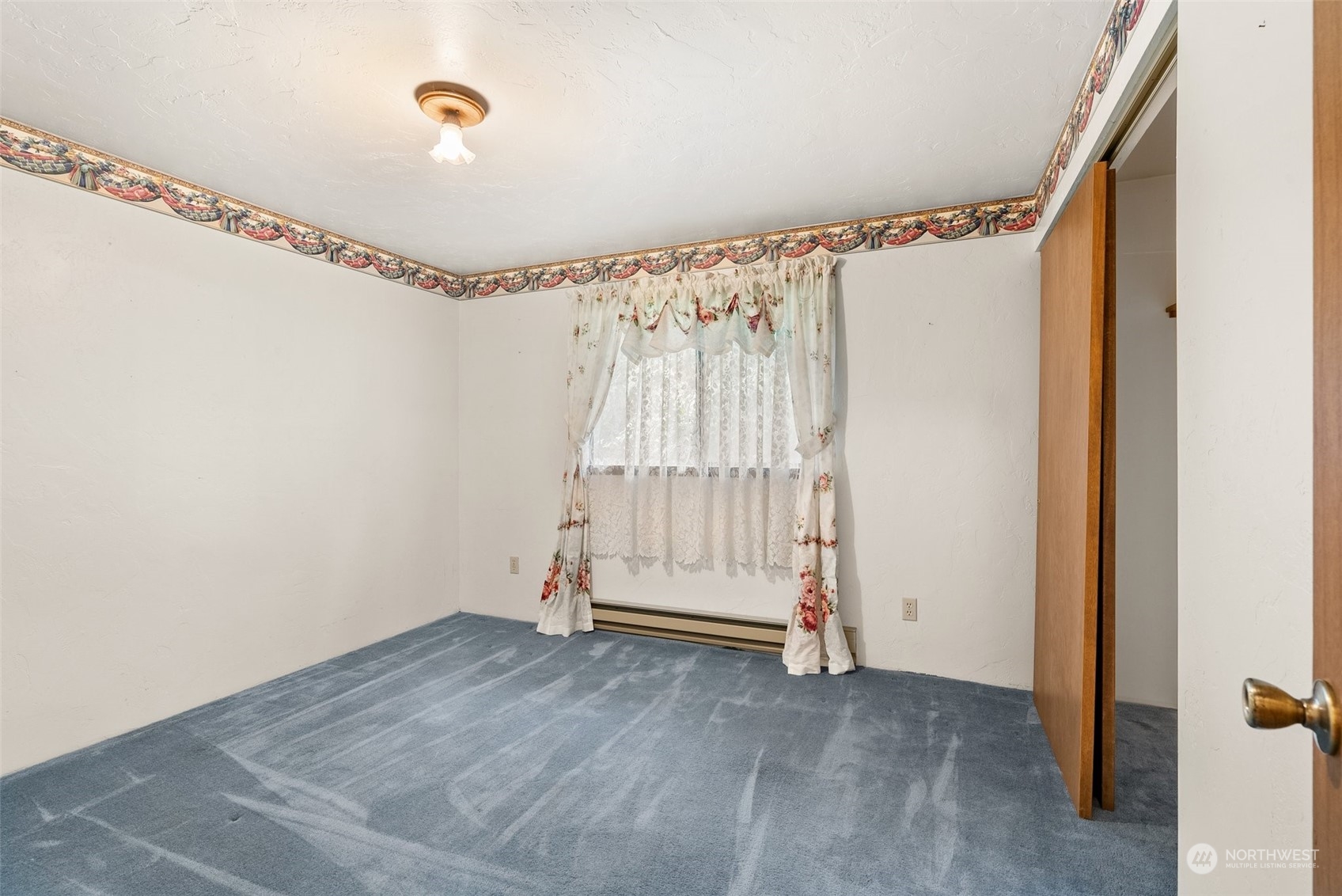 684 Nevil Road Winlock, WA 98596 - Photo 16 of 26 a view of an empty room with a window