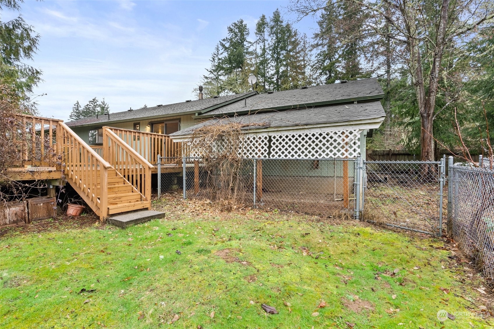 684 Nevil Road Winlock, WA 98596 - Photo 23 of 26 a view of a house with a yard