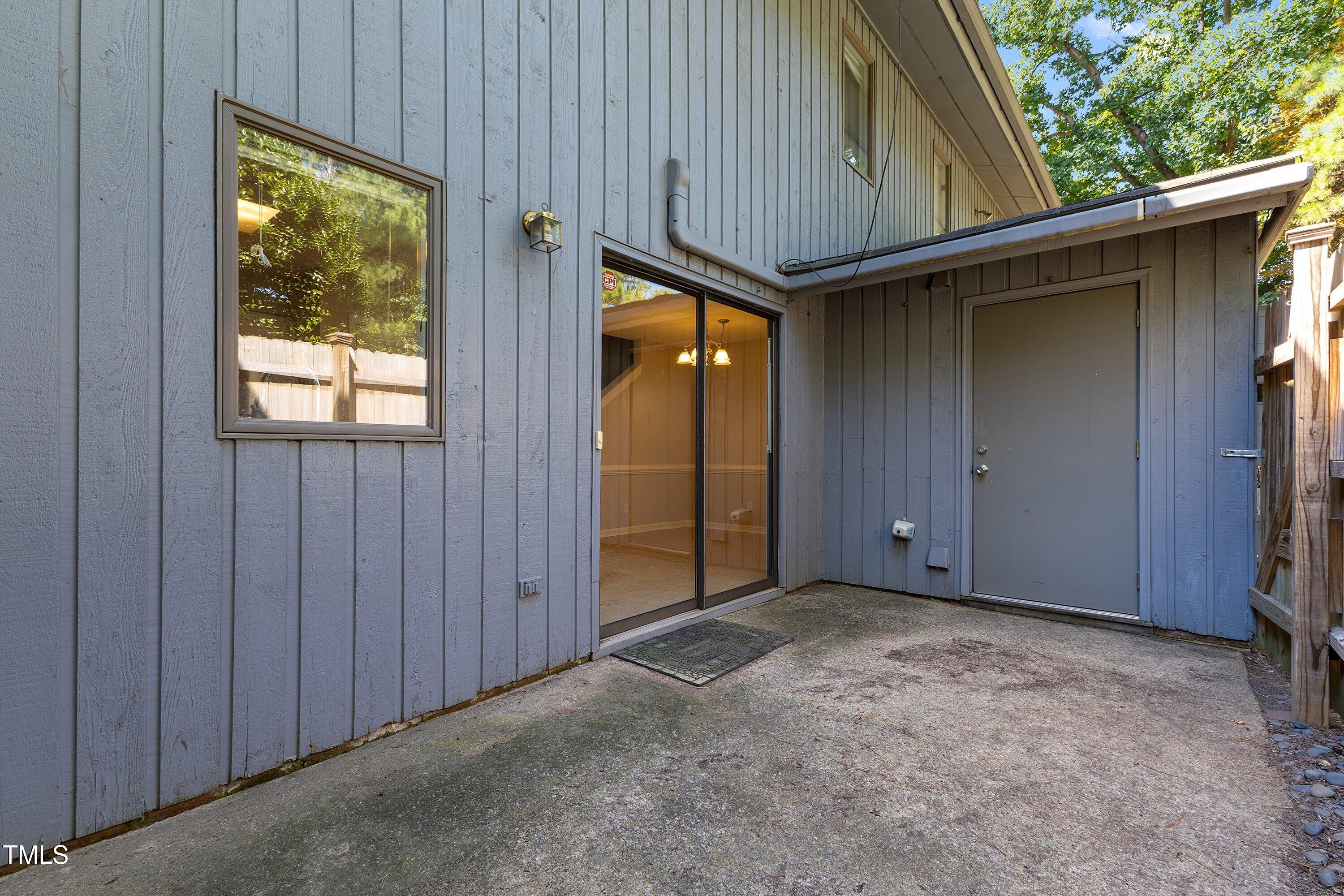 4350 Hunters Club Drive Raleigh, NC 27606 - Photo 24 of 33 an empty room with windows