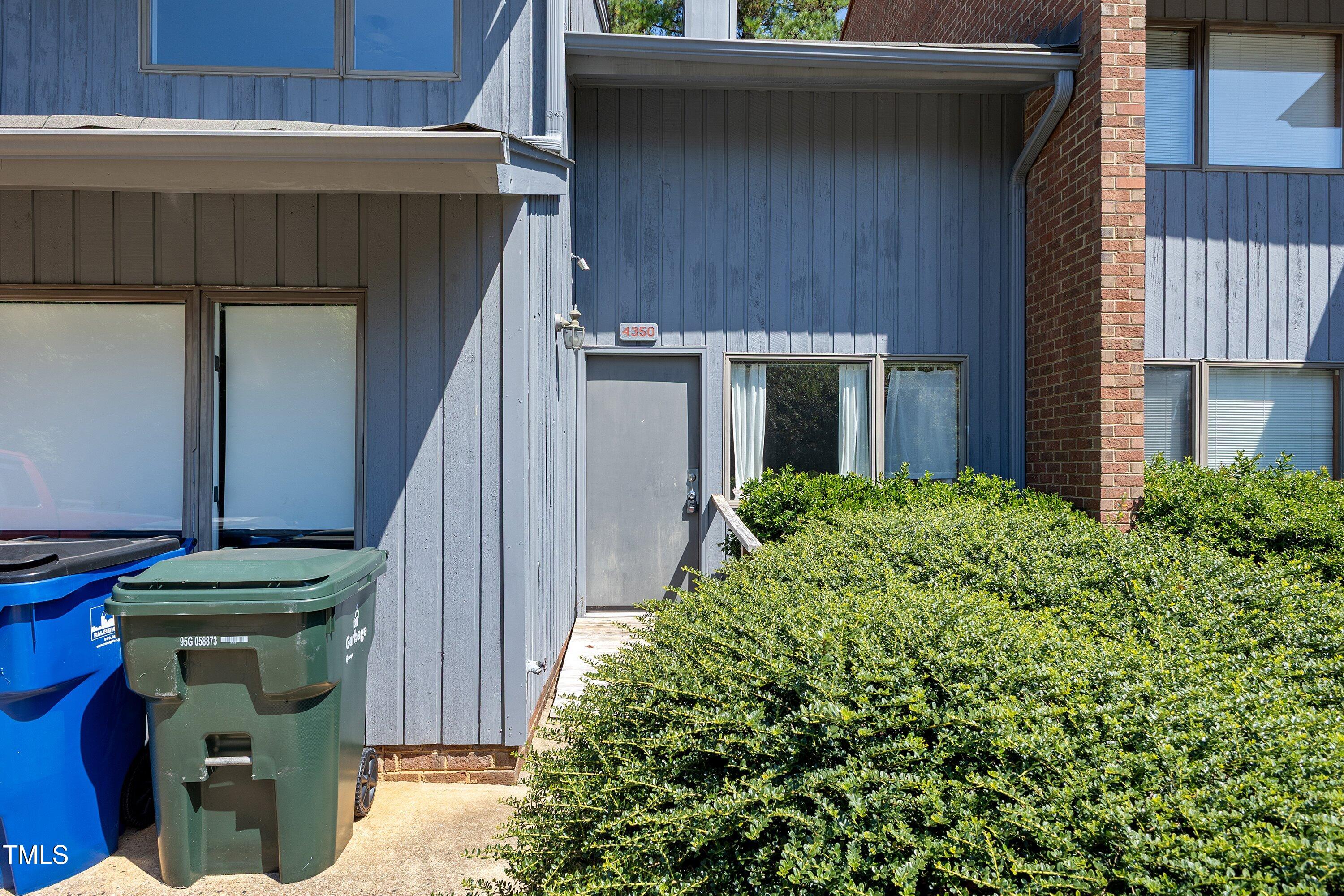 4350 Hunters Club Drive Raleigh, NC 27606 - Photo 31 of 33 a view of a house with a small cabin