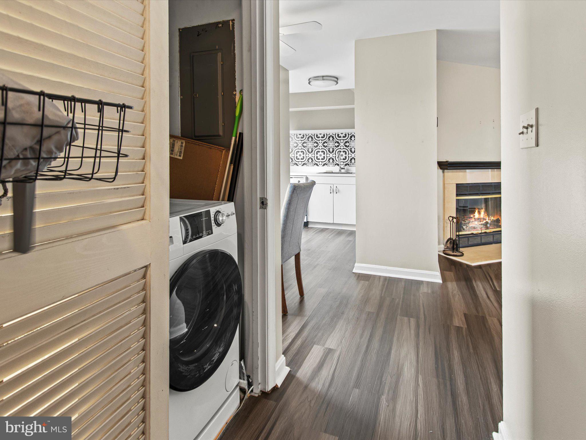 911 South Charles Street, Unit 409 Baltimore, MD 21230 - Photo 13 of 16 a view of a kitchen with washer and dryer