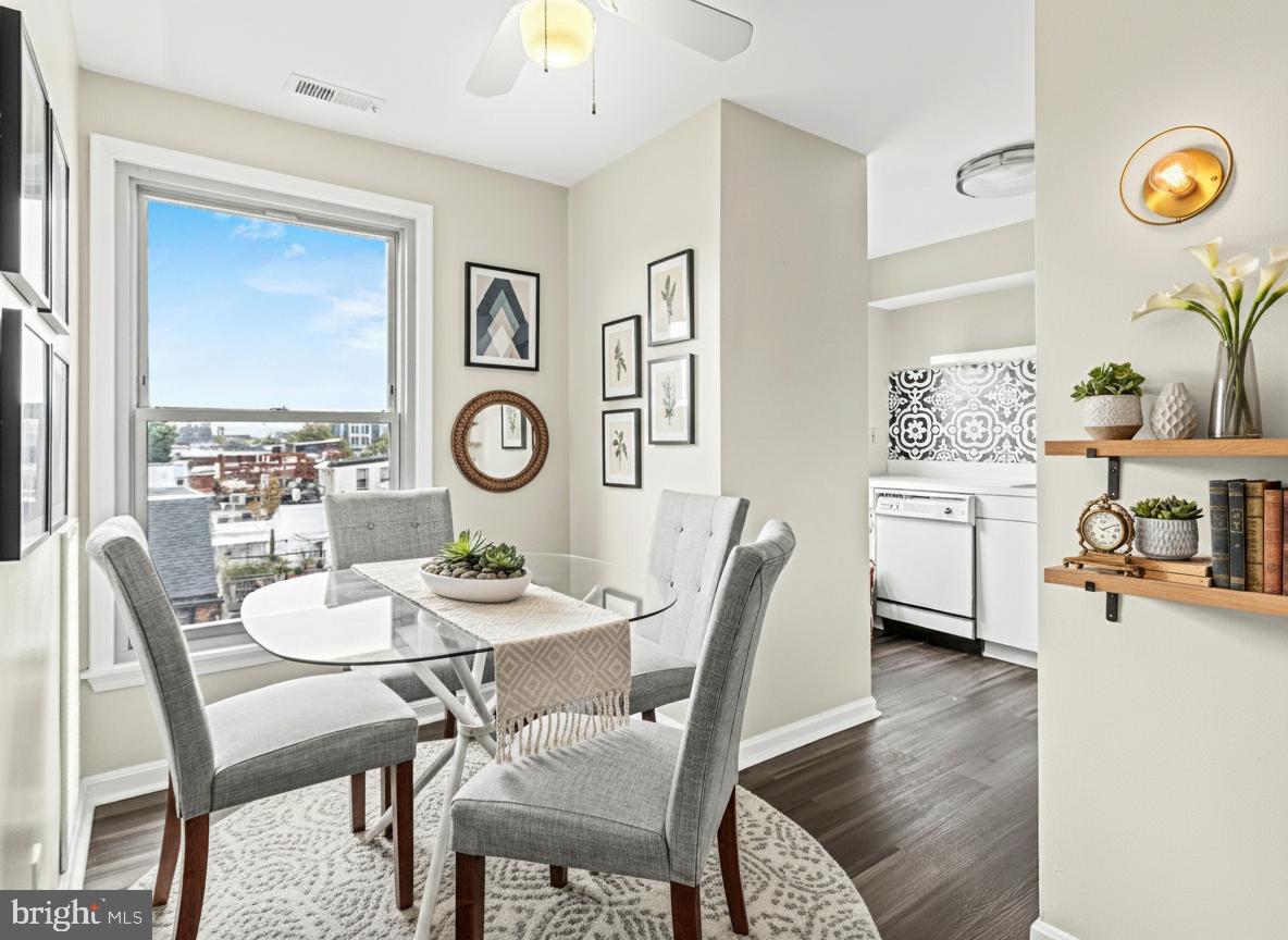 911 South Charles Street, Unit 409 Baltimore, MD 21230 - Photo 5 of 16 a view of a dining room with furniture and window