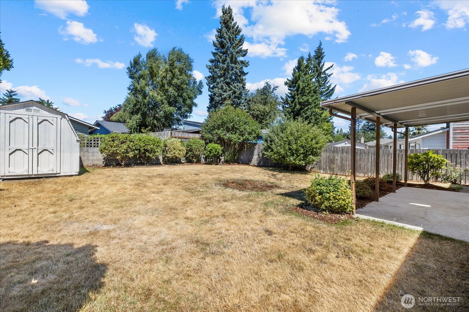 16531 120th Avenue Southeast Renton, WA 98058 - Photo 19 of 25 a view of a backyard of the house