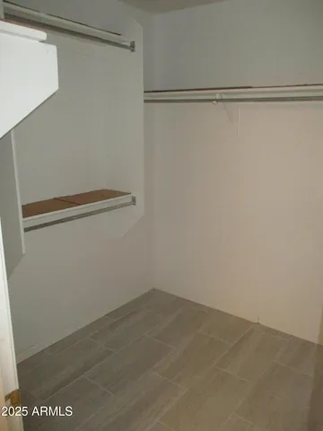 a view of a room with racks on the wall