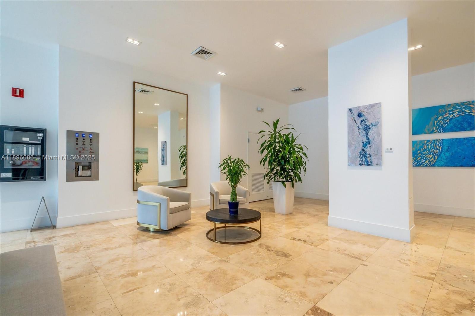 2101 South Ocean Drive, Unit 905 Hollywood, FL 33019 - Photo 2 of 38 a view of a living room and a potted plant