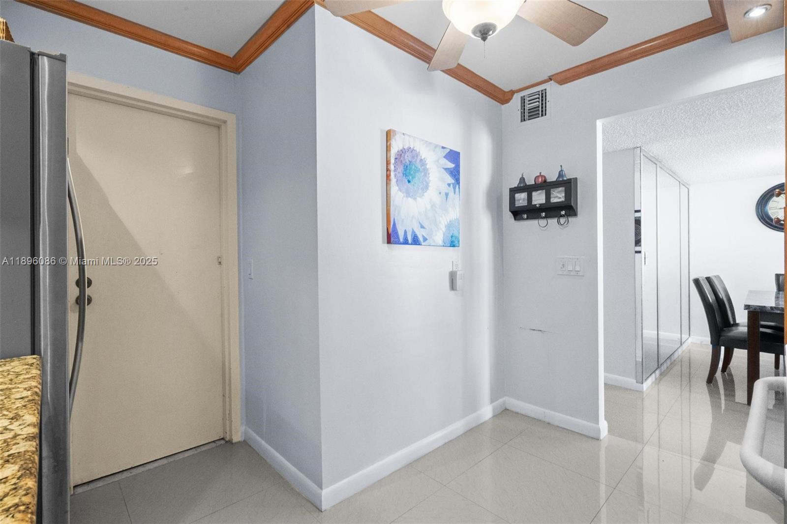 2101 South Ocean Drive, Unit 905 Hollywood, FL 33019 - Photo 7 of 38 a view of kitchen with furniture and refrigerator