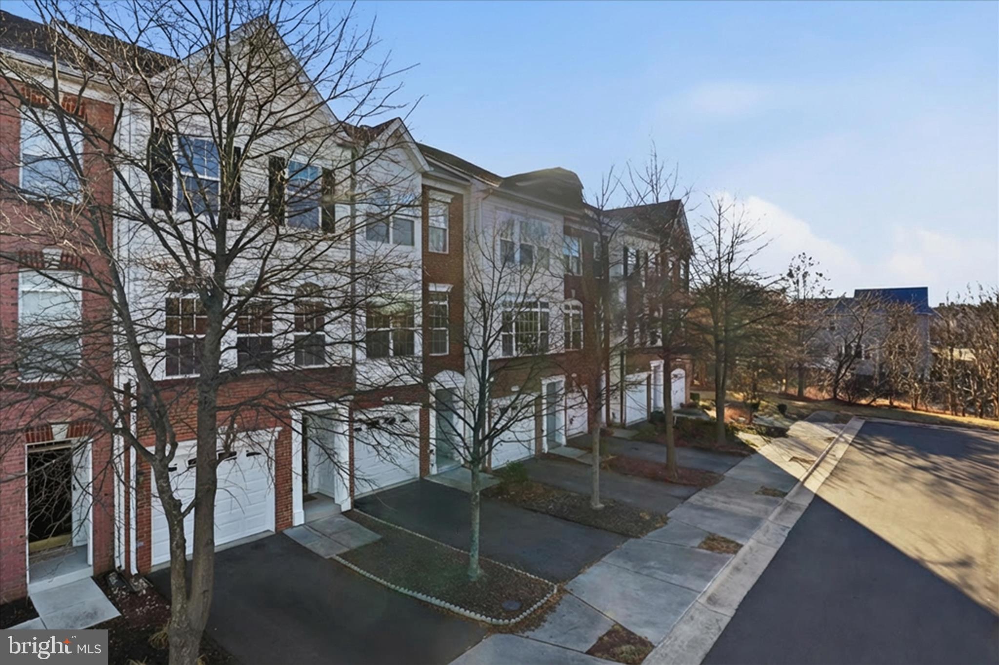 20432 Homeland Terrace Ashburn, VA 20147 - Photo 33 of 43 a view of a patio with iron fence