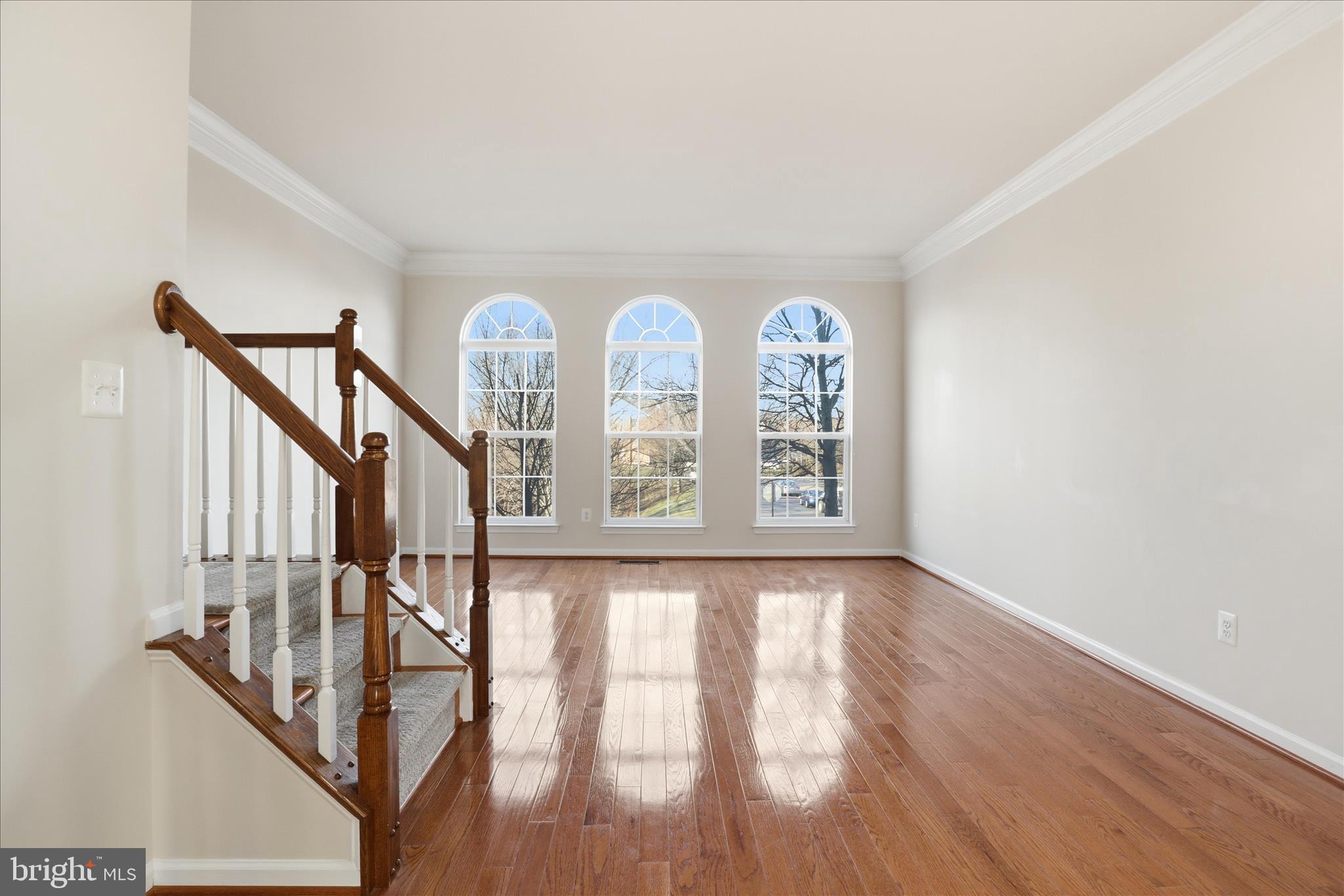 20432 Homeland Terrace Ashburn, VA 20147 - Photo 8 of 43 a view of an entryway with wooden floor