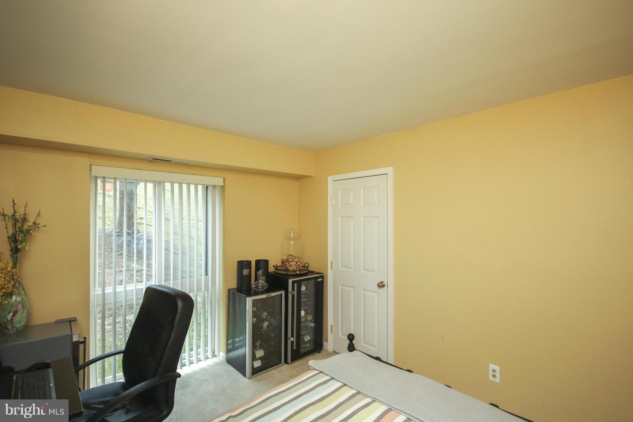 6155 Edsall Road, Unit 6155 Alexandria, VA 22304 - Photo 20 of 29 a view of workspace with wooden floor and windows