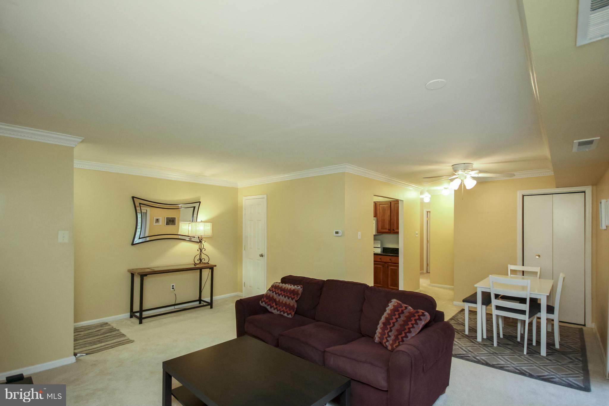 6155 Edsall Road, Unit 6155 Alexandria, VA 22304 - Photo 8 of 29 a living room with furniture