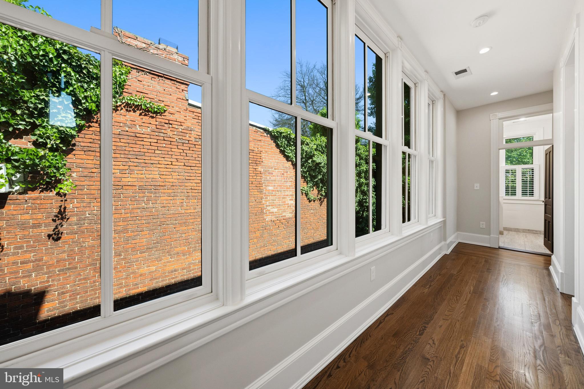 3420 P Street Northwest Washington, DC 20007 - Photo 13 of 32 a view of an entryway with wooden floor and door
