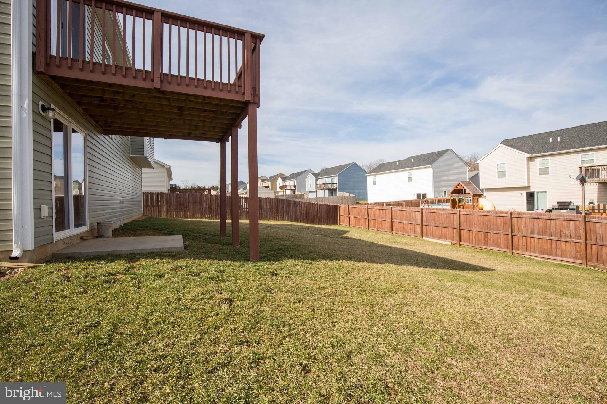 125 Job Road Inwood, WV 25428 - Photo 14 of 32 Deck overlooks the large, fenced yard