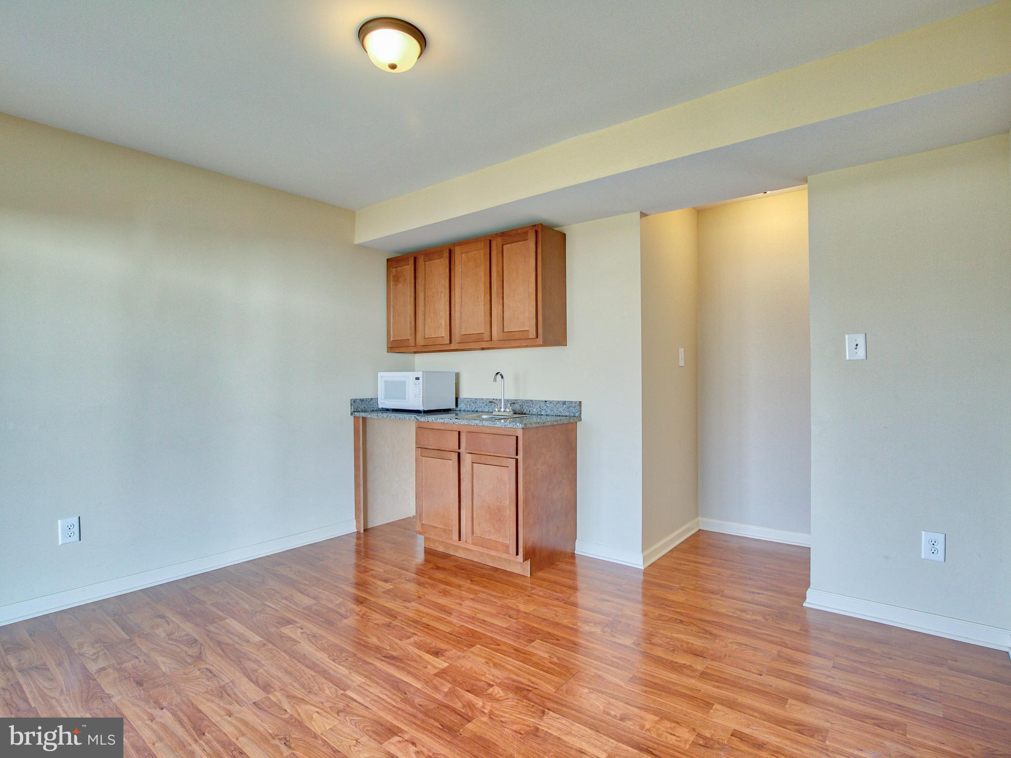 125 Job Road Inwood, WV 25428 - Photo 24 of 32 Lower level game/living room with wetbar!