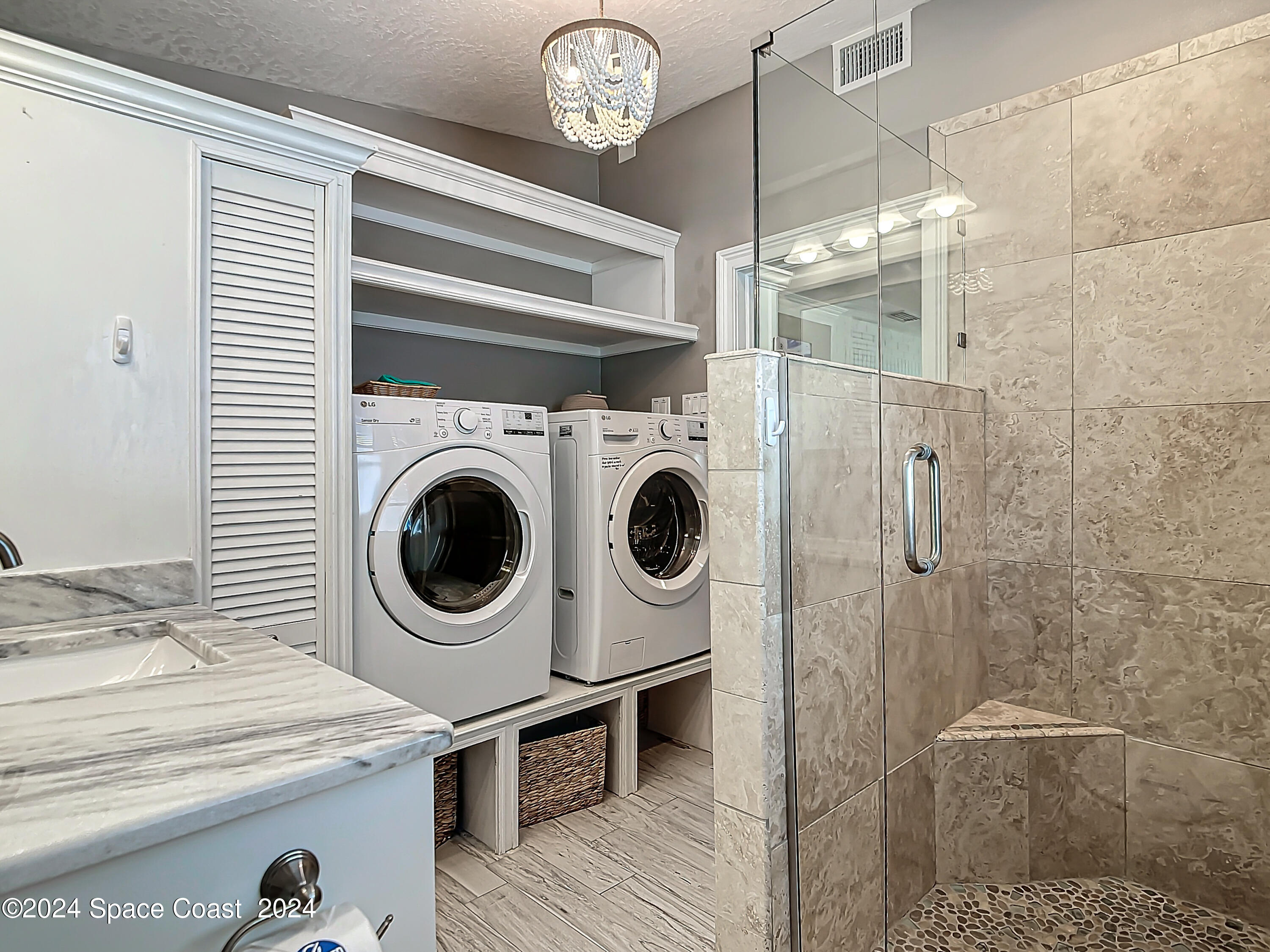 230 Rita Boulevard Melbourne Beach, FL 32951 - Photo 31 of 36 a utility room with dryer and washer