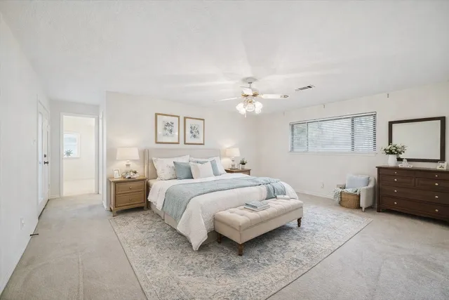 a bath room with a bath tub and a shower