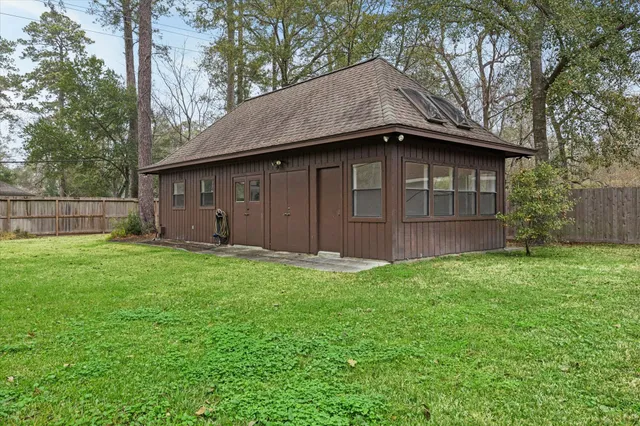 a bathroom with a sink and a window