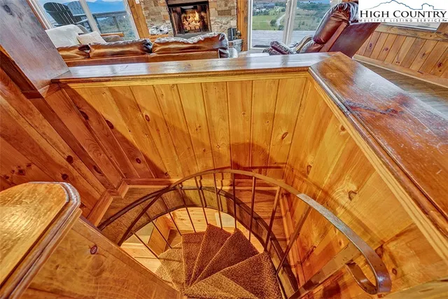 a view of swimming pool with seating area