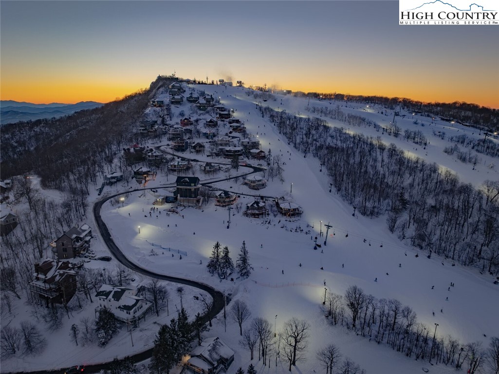 127 Skiloft Road Beech Mountain, NC 28604 - Photo 2 of 42 a view of a backyard of a house