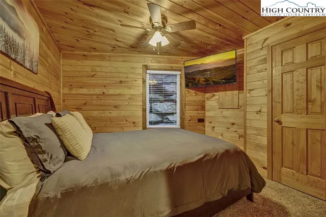 a bedroom with a bed and a walk in closet