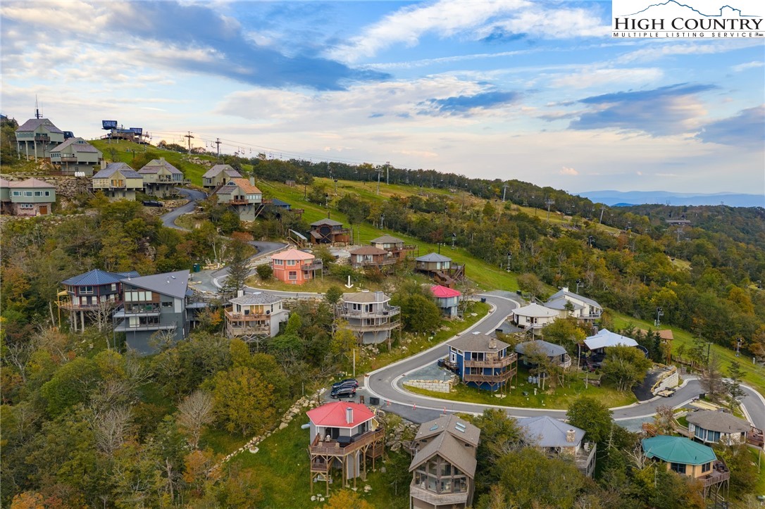 127 Skiloft Road Beech Mountain, NC 28604 - Photo 32 of 42 a view of a town with mountains in the background