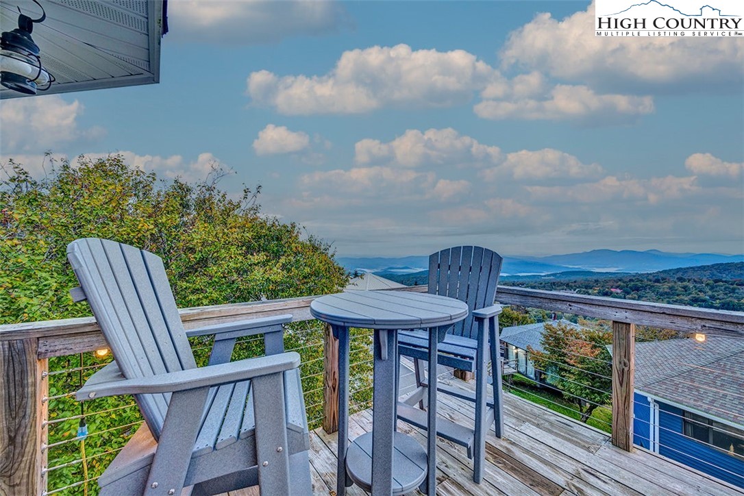 127 Skiloft Road Beech Mountain, NC 28604 - Photo 40 of 42 a view of a chair and table in the balcony