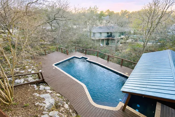 a view of a balcony with an outdoor space