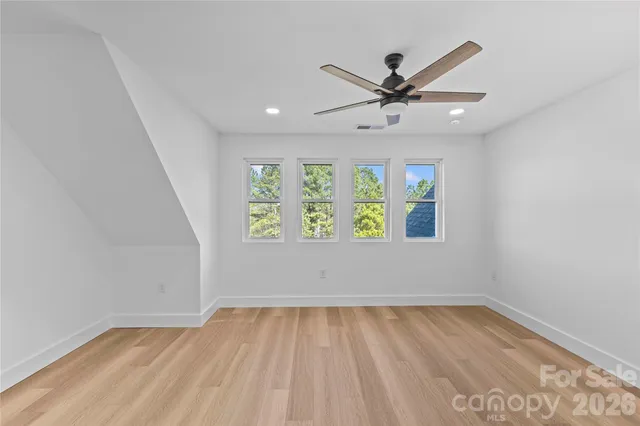 an aerial view of a house with outdoor space