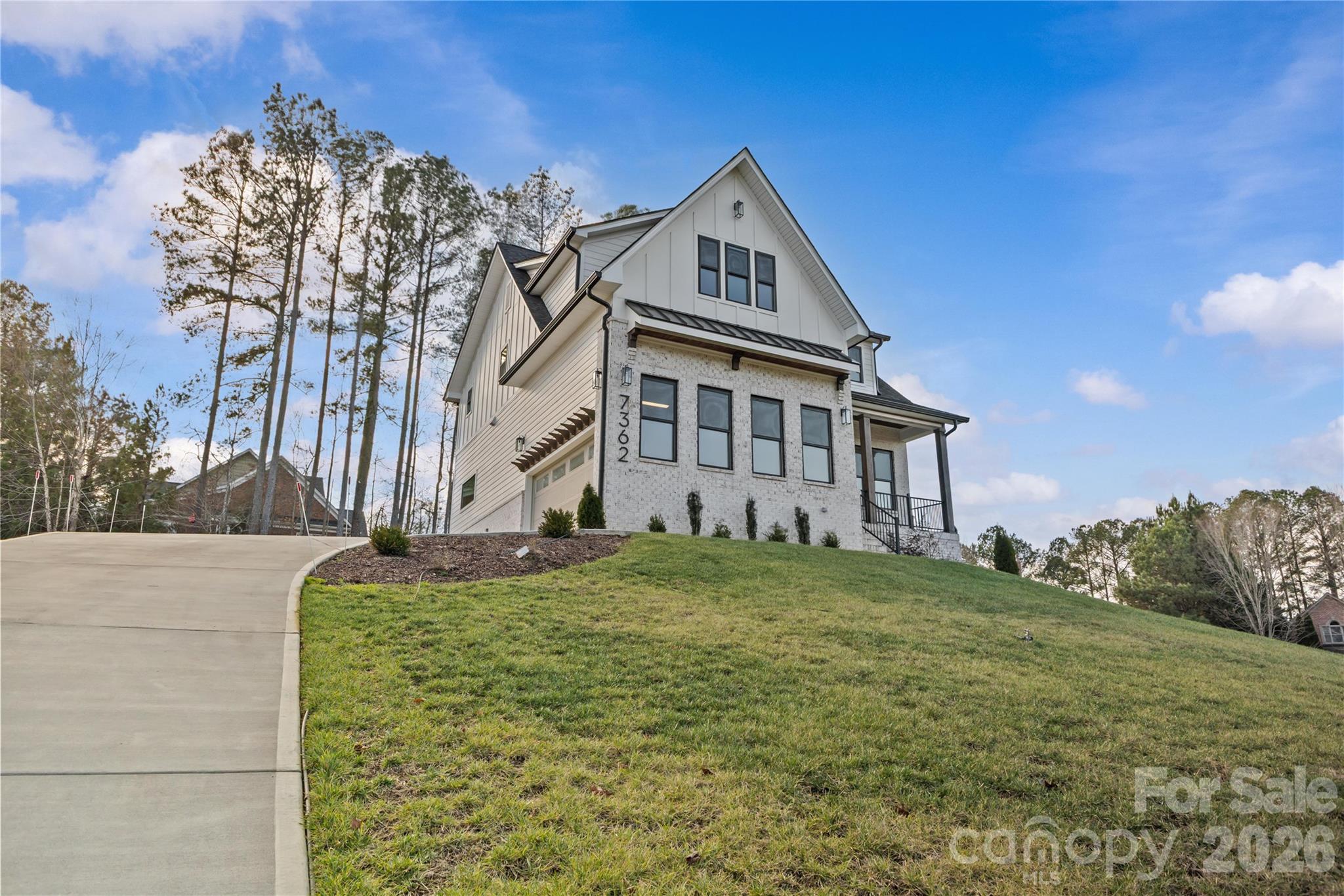 7362 Hemlock Court Denver, NC 28037 - Photo 37 of 46 a front view of a house with a yard