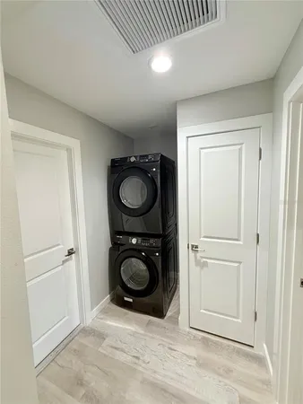 a view of washer and dryer in a utility room