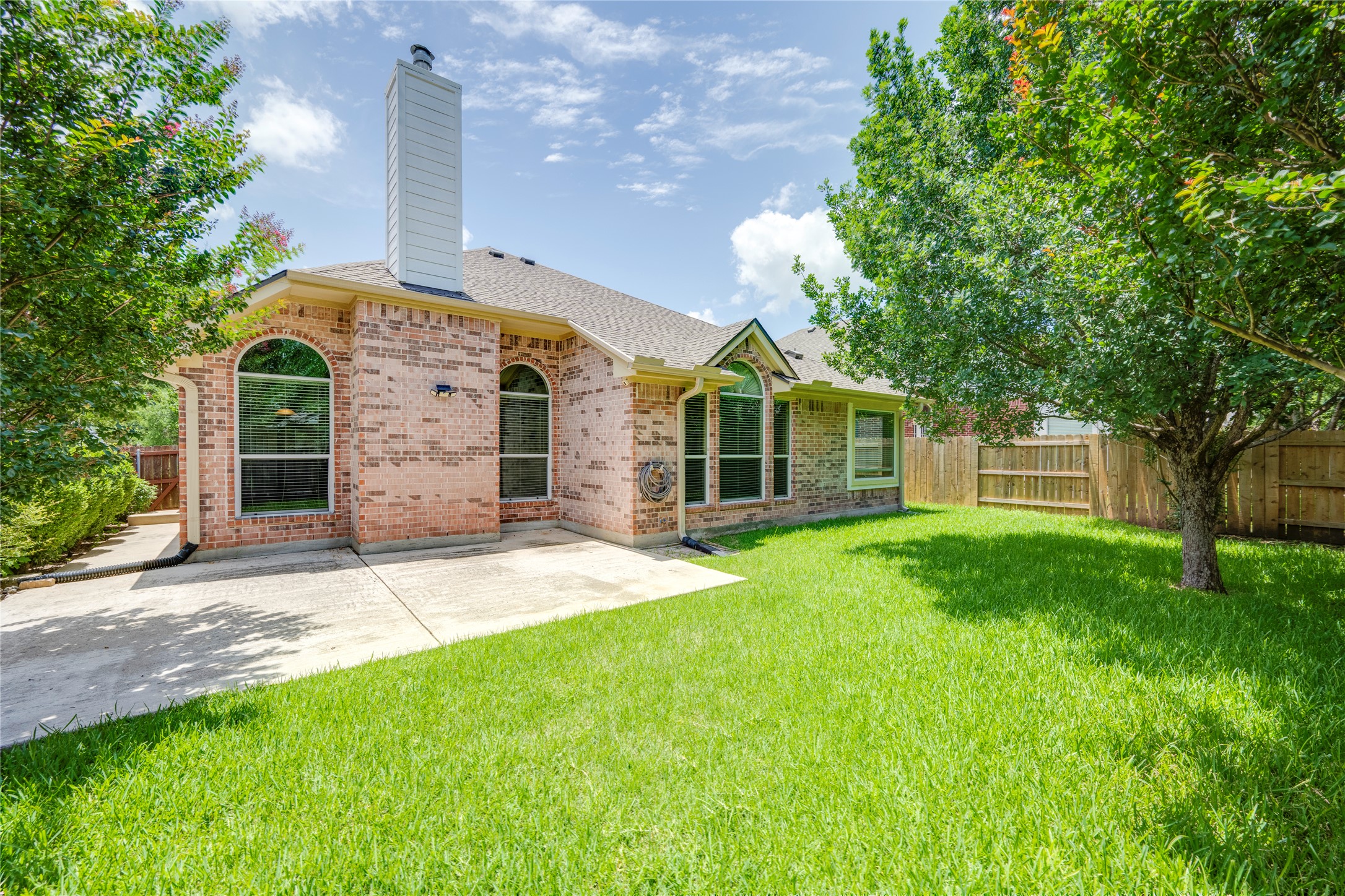 1813 Nelson Ranch Loop Cedar Park, TX 78613 - Photo 32 of 39 A well-maintained brick exterior and lush green lawn provide ample curb appeal for this inviting home.