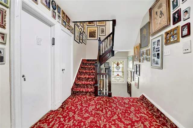 a view of a hallway with windows