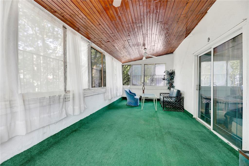 511 Argyle Road Brooklyn, NY 11218 - Photo 18 of 19 a view of an chairs with table and chairs in backyard