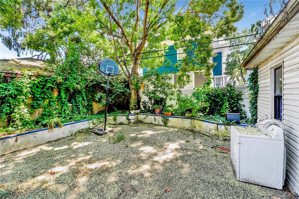 511 Argyle Road Brooklyn, NY 11218 - Photo 4 of 19 a view of a backyard with a white house