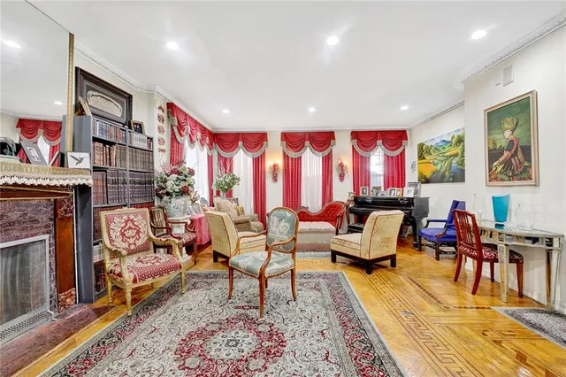 a living room with furniture or couch and a fireplace