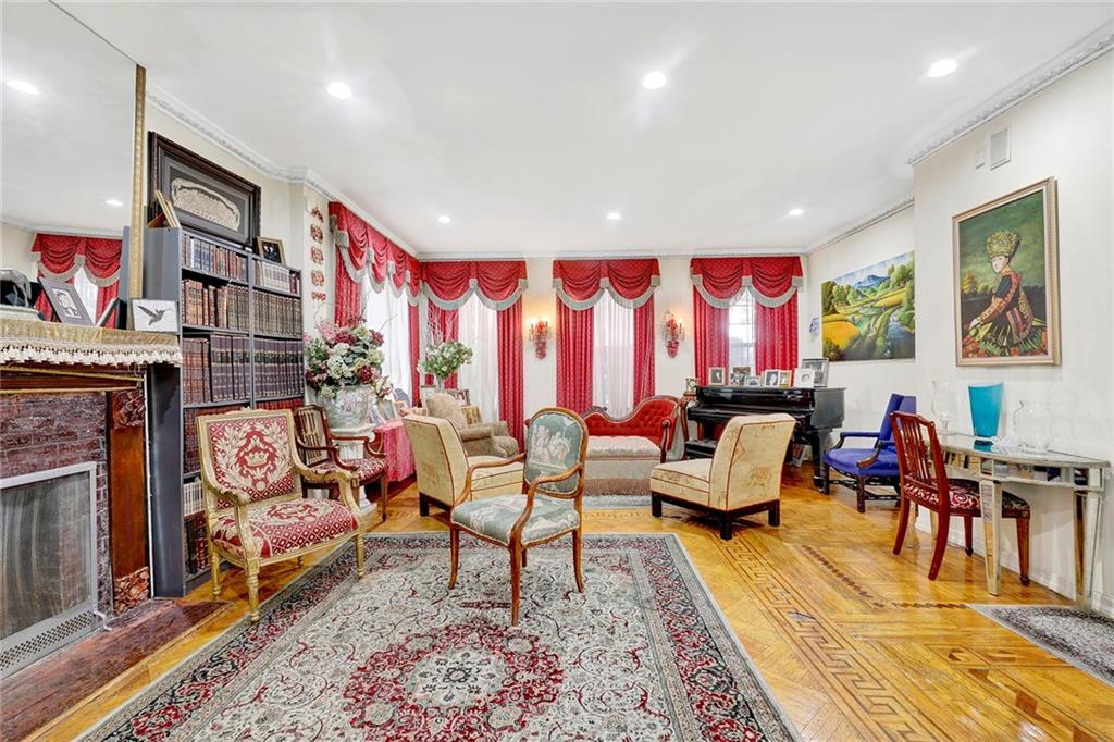 511 Argyle Road Brooklyn, NY 11218 - Photo 7 of 19 a living room with furniture or couch and a fireplace