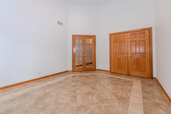 a view of a storage & utility room with two washing machine