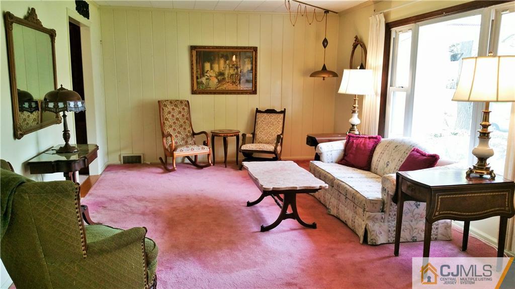 1 Maida Road Edison, NJ 08820 - Photo 2 of 17 a bedroom with furniture and a window