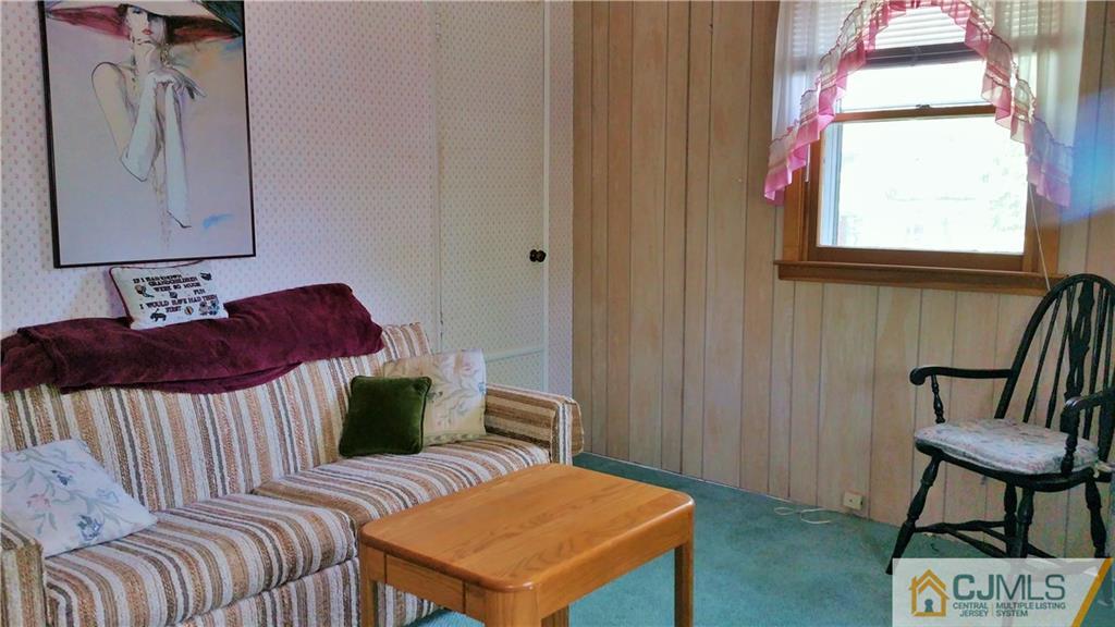 1 Maida Road Edison, NJ 08820 - Photo 15 of 17 a bedroom with a bed a couch and dresser
